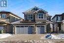 239 Kinniburgh Loop, Chestermere, AB  - Outdoor With Facade 