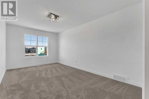 239 Kinniburgh Loop, Chestermere, AB - Indoor Photo Showing Other Room