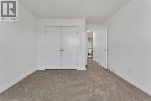 239 Kinniburgh Loop, Chestermere, AB - Indoor Photo Showing Other Room