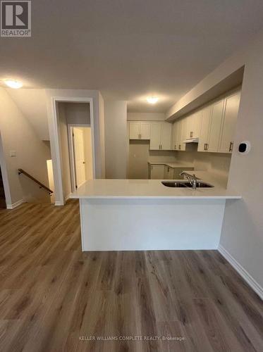 148 - 677 Park Road N, Brantford, ON - Indoor Photo Showing Kitchen With Double Sink