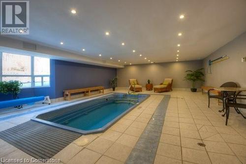 View of swimming pool featuring a jacuzzi - 55 Green Valley Drive Drive Unit# 1806, Kitchener, ON - Indoor Photo Showing Other Room With In Ground Pool