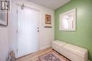 Foyer entrance featuring a textured ceiling and light wood-type flooring - 55 Green Valley Drive Drive Unit# 1806, Kitchener, ON  - Indoor Photo Showing Other Room 