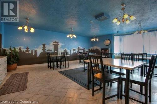 Dining area featuring a textured ceiling - 55 Green Valley Drive Drive Unit# 1806, Kitchener, ON - Indoor Photo Showing Dining Room