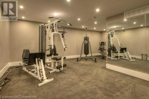 Workout area featuring dark colored carpet - 55 Green Valley Drive Drive Unit# 1806, Kitchener, ON - Indoor Photo Showing Gym Room