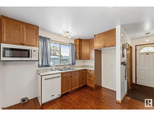 3907 112A St Nw, Edmonton, AB - Indoor Photo Showing Kitchen With Double Sink