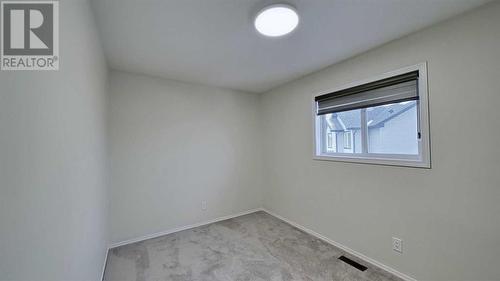 246 Saddlefield Place Ne, Calgary, AB - Indoor Photo Showing Other Room