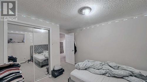 246 Saddlefield Place Ne, Calgary, AB - Indoor Photo Showing Bedroom