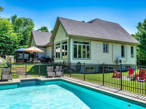 Back facade - 6078 Rue Du Haut-Bois, Val-Morin, QC - Outdoor With In Ground Pool