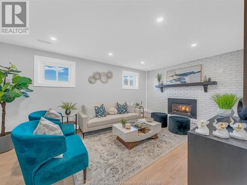 12183 Valente, Tecumseh, ON - Indoor Photo Showing Living Room With Fireplace