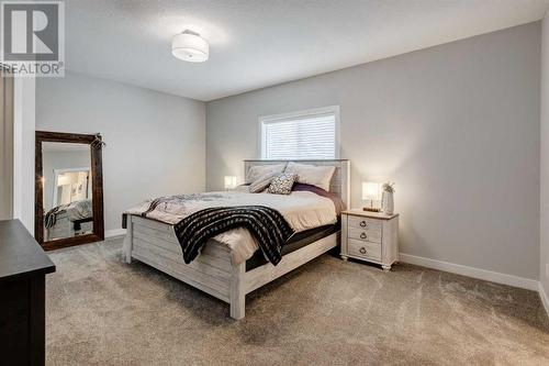 45 Mackenzie Way, Carstairs, AB - Indoor Photo Showing Bedroom