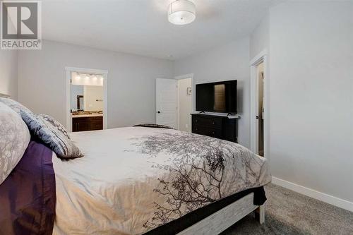 45 Mackenzie Way, Carstairs, AB - Indoor Photo Showing Bedroom