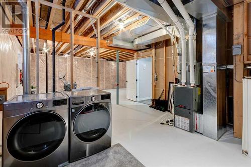 45 Mackenzie Way, Carstairs, AB - Indoor Photo Showing Laundry Room