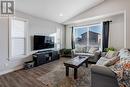 45 Mackenzie Way, Carstairs, AB  - Indoor Photo Showing Living Room 