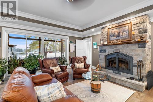 308 O'Hara Point Road, Georgian Bay (Baxter), ON - Indoor Photo Showing Living Room With Fireplace