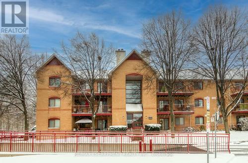 134 - 1496 Pilgrims Way, Oakville, ON - Outdoor With Balcony With Facade