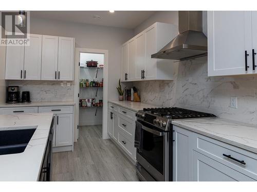 2012 Pierson Street, Terrace, BC - Indoor Photo Showing Kitchen With Double Sink With Upgraded Kitchen