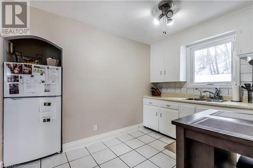 White Tile Floors In Kitchen - 111 Spruce Street, Cambridge, ON - Indoor Photo Showing Kitchen With Double Sink