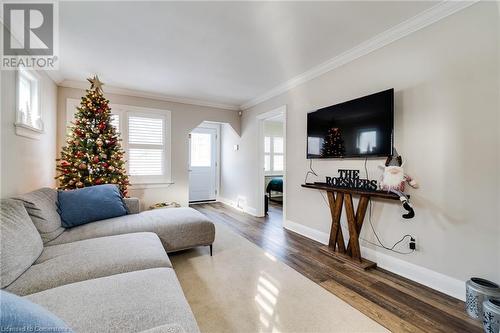 Living room featuring dark hardwood / wood-style floors and ornamental molding - 245 St Andrews Street, Cambridge, ON - Indoor Photo Showing Living Room