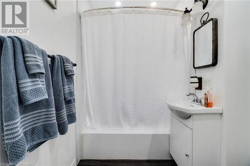 Bathroom with shower / tub combo with curtain and vanity - 245 St Andrews Street, Cambridge, ON - Indoor Photo Showing Bathroom