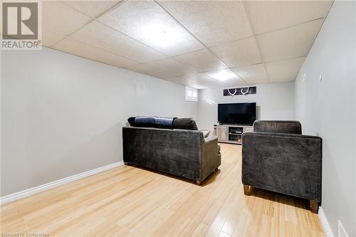 Living room featuring wood-type flooring and a paneled ceiling - 245 St Andrews Street, Cambridge, ON - Indoor Photo Showing Other Room