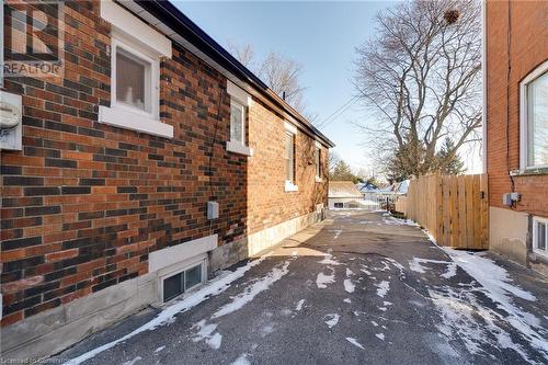 View of snow covered exterior - 245 St Andrews Street, Cambridge, ON - Outdoor With Exterior