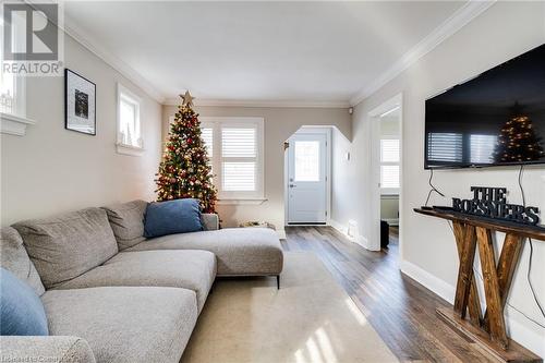 Living room featuring hardwood / wood-style flooring and ornamental molding - 245 St Andrews Street, Cambridge, ON - Indoor Photo Showing Living Room