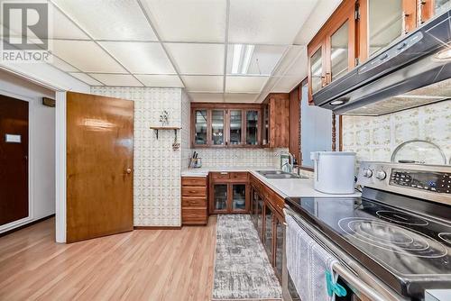 12804 108 Street Nw, Edmonton, AB - Indoor Photo Showing Kitchen With Double Sink