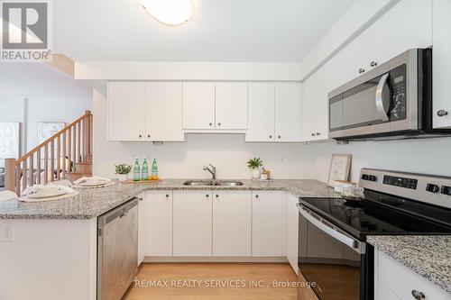 1 - 26 Humberwood Boulevard, Toronto, ON - Indoor Photo Showing Kitchen With Stainless Steel Kitchen With Double Sink