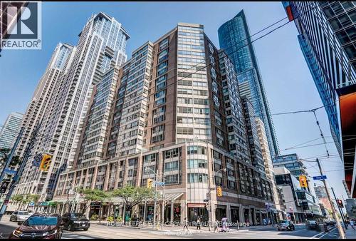 810 - 717 Bay Street, Toronto, ON - Outdoor With Facade