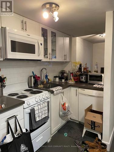 810 - 717 Bay Street, Toronto, ON - Indoor Photo Showing Kitchen With Double Sink