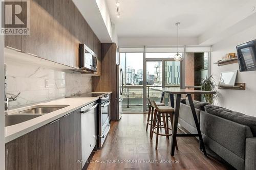 710 - 50 Bruyeres Mews, Toronto, ON - Indoor Photo Showing Kitchen With Double Sink With Upgraded Kitchen