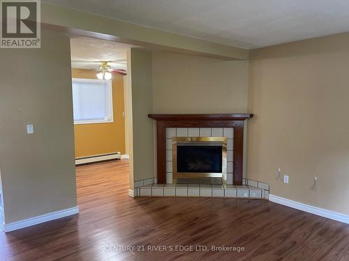 B - 22 Chaffey Street, Brockville, ON - Indoor With Fireplace