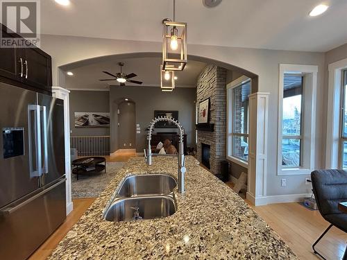 Kitchen island - 12686 Cliffshore Drive, Lake Country, BC - Indoor Photo Showing Kitchen With Double Sink