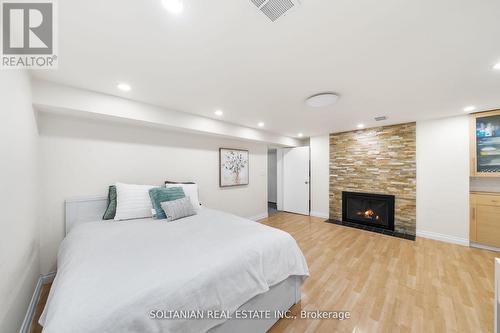 38 Citation Drive, Toronto, ON - Indoor Photo Showing Bedroom With Fireplace