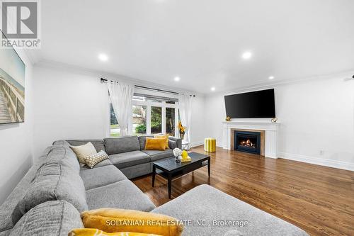 38 Citation Drive, Toronto, ON - Indoor Photo Showing Living Room With Fireplace