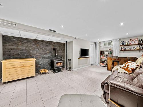 Family room - 2155 Rue Hector, Drummondville, QC - Indoor Photo Showing Other Room With Fireplace