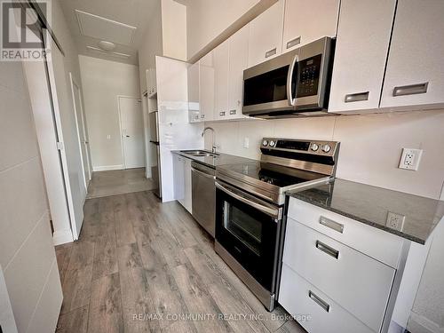 105 - 652 Princess Street W, Kingston, ON - Indoor Photo Showing Kitchen With Stainless Steel Kitchen With Double Sink