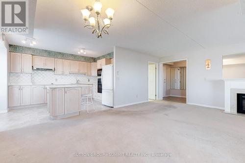 202 - 870 Upper Wentworth Street, Hamilton, ON - Indoor Photo Showing Kitchen With Fireplace