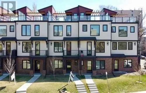 3 storey townhome with roof-top patio! - 2222 5 Street Sw, Calgary, AB - Outdoor With Facade