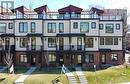 3 storey townhome with roof-top patio! - 2222 5 Street Sw, Calgary, AB  - Outdoor With Facade 