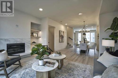 2222 5 Street Sw, Calgary, AB - Indoor Photo Showing Living Room With Fireplace