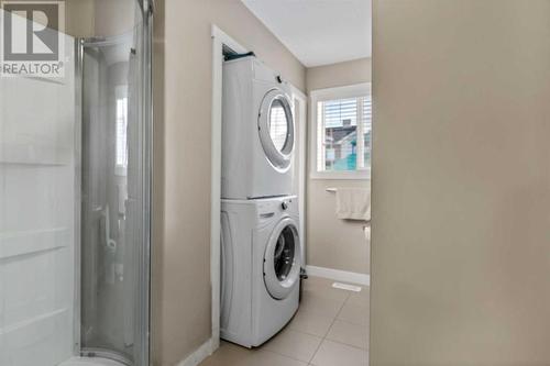 Laundry with standing shower washroom - 729 Skyview Ranch Grove, Calgary, AB - Indoor Photo Showing Laundry Room