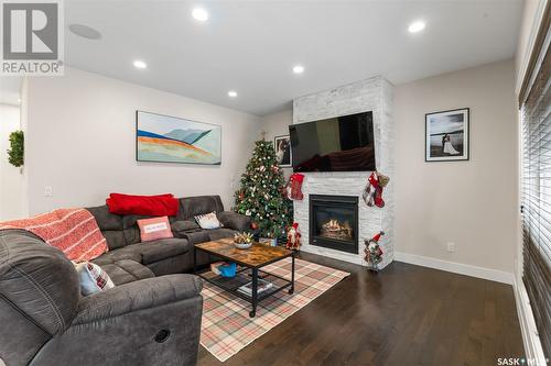 526 Baltzan Bay, Saskatoon, SK - Indoor Photo Showing Living Room With Fireplace