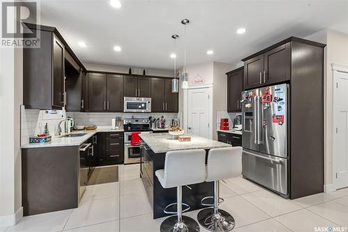 526 Baltzan Bay, Saskatoon, SK - Indoor Photo Showing Kitchen With Upgraded Kitchen