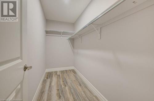 Spacious closet featuring light hardwood / wood-style flooring - 705 Hollinger Drive S, Listowel, ON - Indoor With Storage