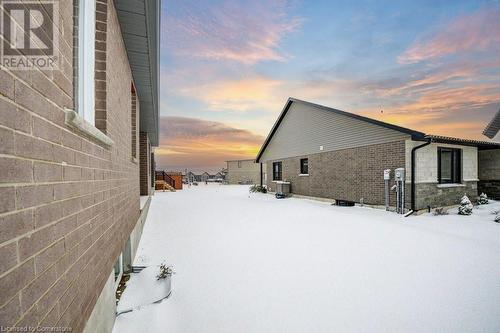 View of snow covered exterior with cooling unit - 705 Hollinger Drive S, Listowel, ON - Outdoor