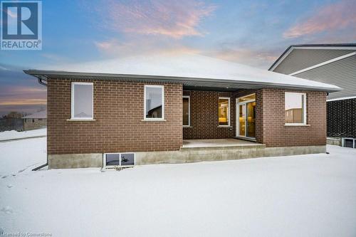 View of snow covered house - 705 Hollinger Drive S, Listowel, ON - Outdoor With Exterior