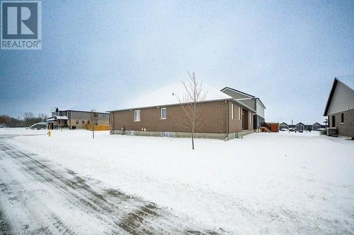 View of snow covered property - 705 Hollinger Drive S, Listowel, ON - Outdoor With Exterior