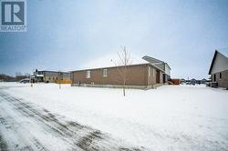 View of snow covered property - 