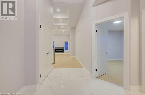 Hallway with beamed ceiling, crown molding, and coffered ceiling - 705 Hollinger Drive S, Listowel, ON - Indoor Photo Showing Other Room